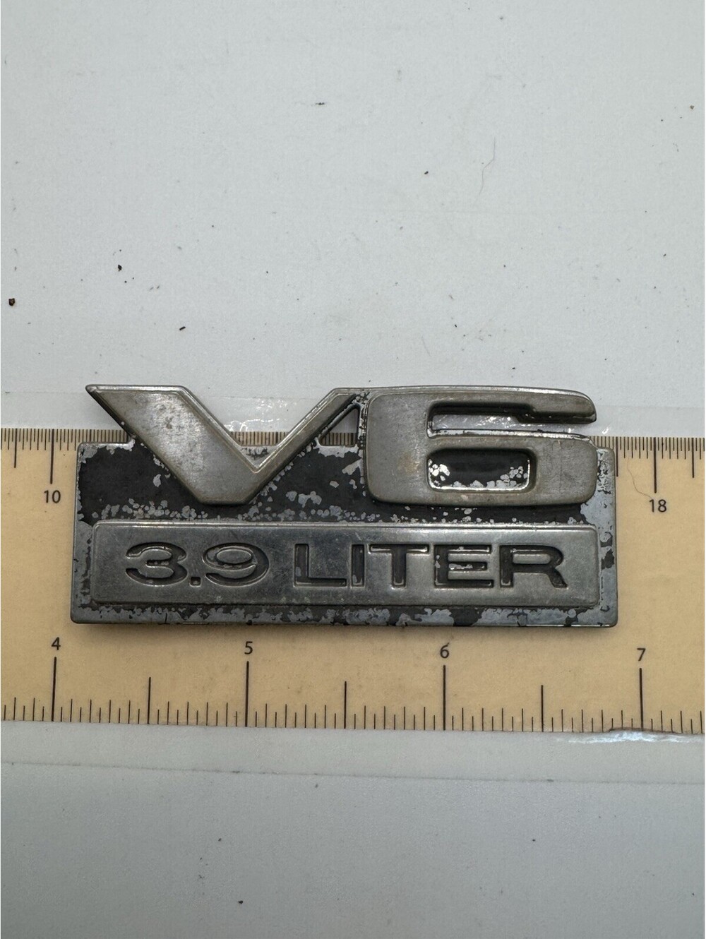 1987-1990 Dodge Dakota "V6 3.9 Liter" Fender Emblem - P/N - 4357096 - As Removed